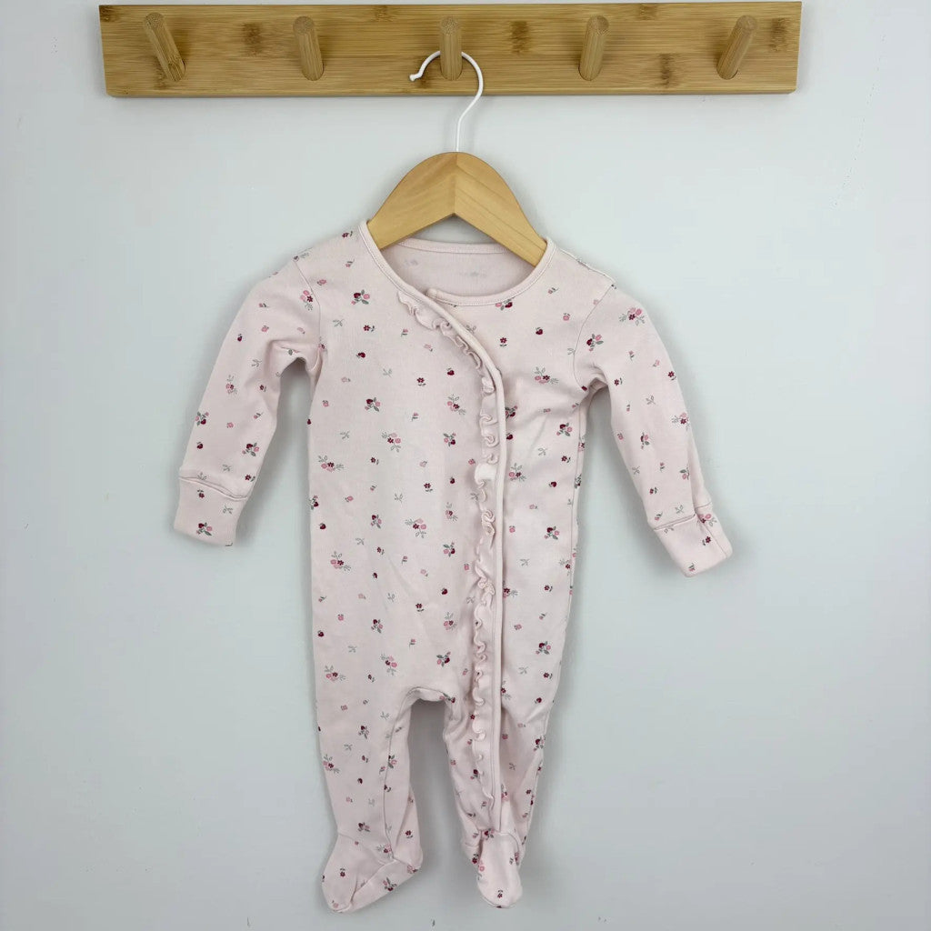 Matalan rózsaszín virágmintás rugdalózó 68