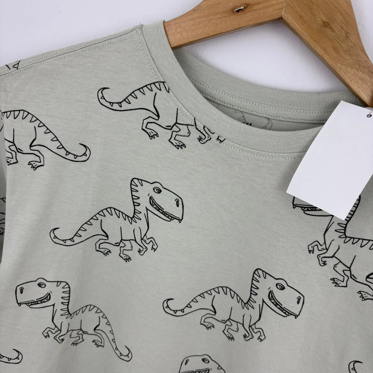 H&M dinoszauruszos hosszú ujjú 122 128 - mintarészlet