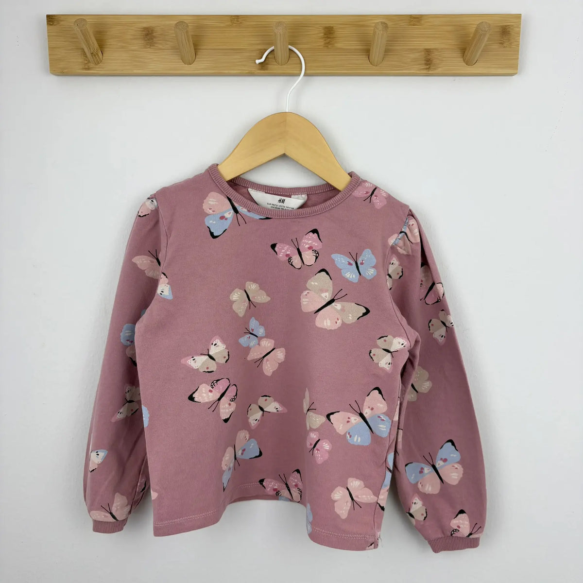 H&M pillangós mintás pulóver 110 116 rózsaszín – teljes nézet