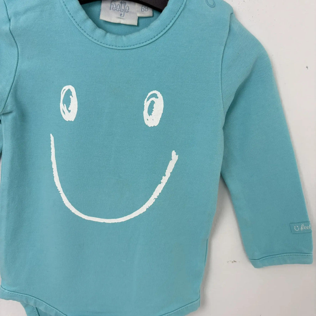 Feetje türkizkék smiley body 68